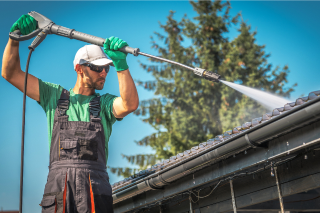 Power washing a roof