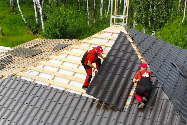 Workers Do the Installation of the Roof